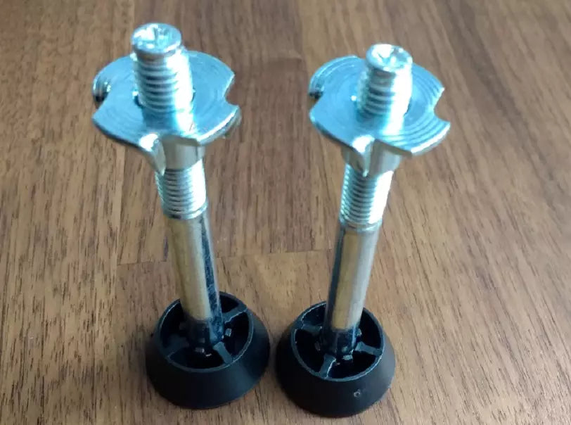 Assembly kit for the base of an IKEA PAX wardrobe. Contains adjustable feet 110617, supports 110618, and screws 100751 for the plinth.
